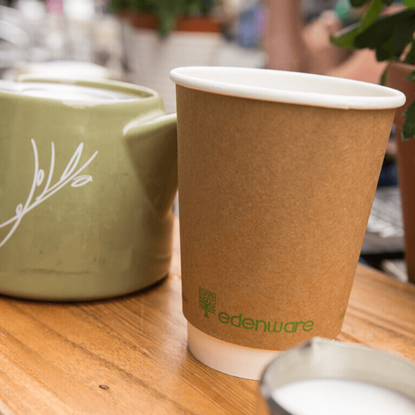 Edenware double wall cup on a cafe table